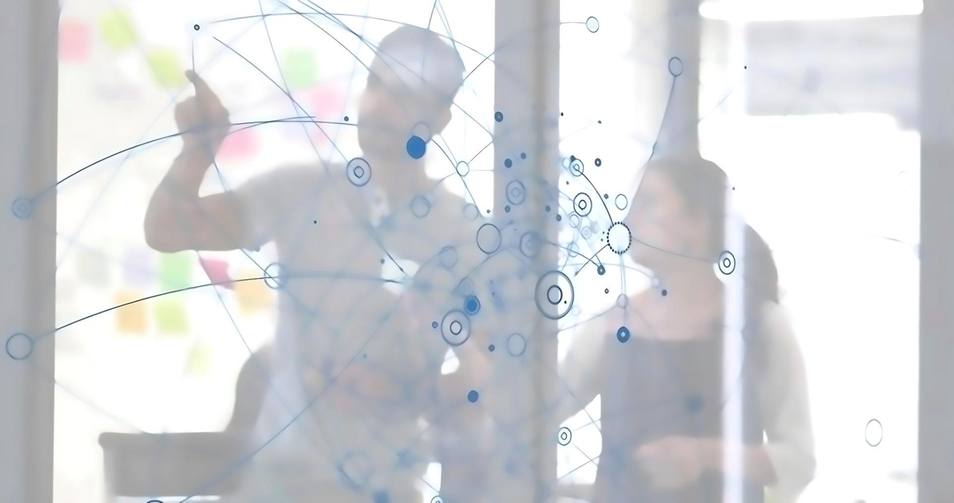 Participants collaborating on blockchain use case analysis during training session